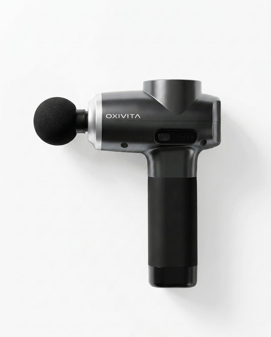 OXIVITA CORE M1 massagepistol med bollhuvud på vit bakgrund